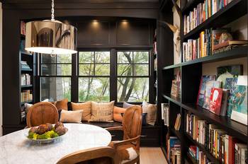 Photo of library in cottage in contemporary style.