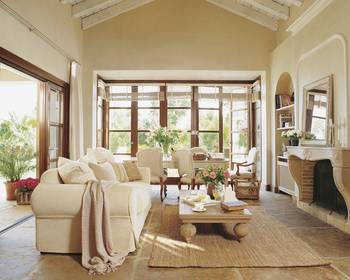 Mediterranean Elegance: Light Interior with Panoramic Glazing and Wooden Beams