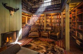 Library interior in house in colonial style.