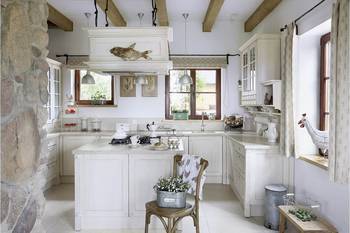 Interior design of kitchen in cottage in Mediterranean style.
