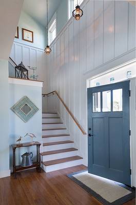 Beautiful design of stairs in cottage in artistic style.