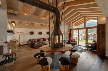 Interior design of attic in country house in Chalet style.