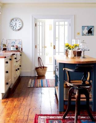 Interior design of kitchen in cottage in Craftsman style.