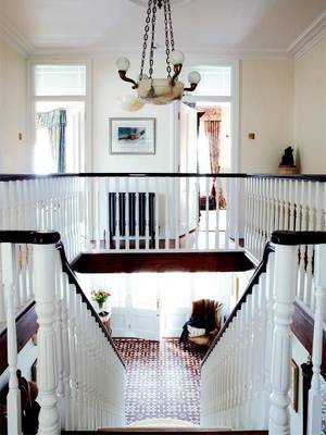 Interior design of stairs in house in colonial style.