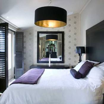 Interior design of bedroom in country house in contemporary style.