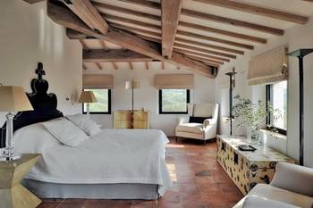 Beautiful example of bedroom in cottage in Chalet style.