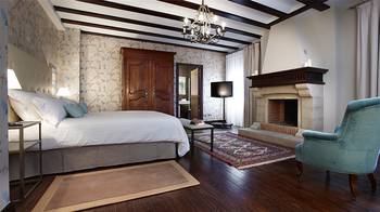 Interior design of bedroom in country house in colonial style.