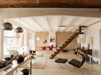 Interior design of studio in house in loft style.