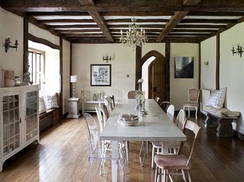 Photo of dining room in country house in colonial style.