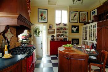 Photo of kitchen in cottage in fusion style.