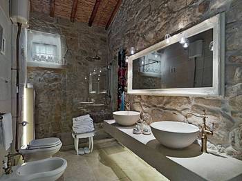 Photo of bathroom in cottage in Mediterranean style.