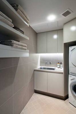 Laundry in house in contemporary style.