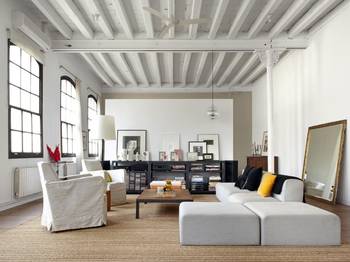Contemporary Loft with Historical Character: White Beams and Minimalist Design