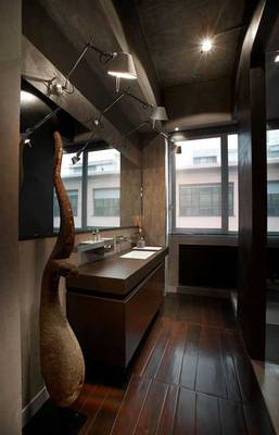 Bathroom design in private house in loft style.