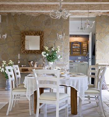 Dining room design in private house in Mediterranean style.