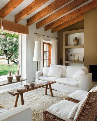 Mediterranean Elegance: Snow-White Interior with Wooden Beams and Natural Harmony