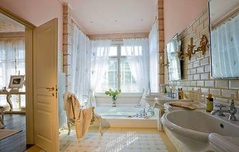 Bathroom interior in house in colonial style.
