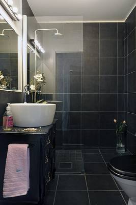 Bathroom design in private house in artistic style.