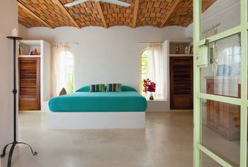 Bedroom design in cottage in Mediterranean style.