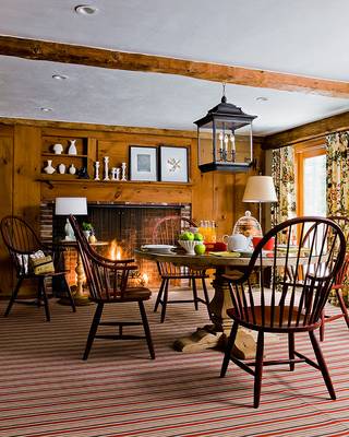Photo of dining room in cottage in Craftsman style.