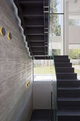 Interior design of stairs in country house in contemporary style.