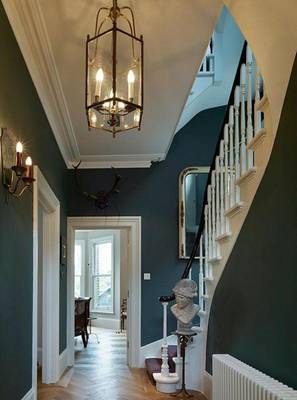 Photo of dark blue color interior in country house.