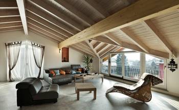 Interior design of attic in private house in scandinavian style.