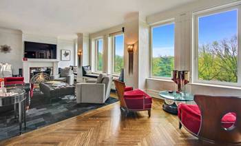 Elegant Living Room with Panoramic Windows: A Blend of Classic and Contemporary