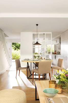 Dining room design in cottage in scandinavian style.