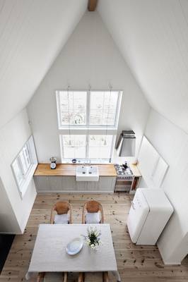 Option of attic in cottage in contemporary style.
