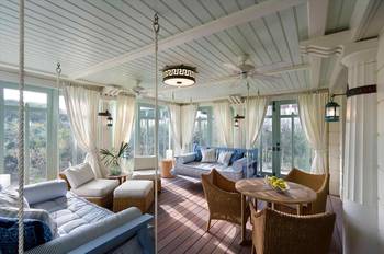 Interior design of veranda in country house.
