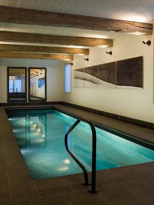 Interior design of pool in country house.