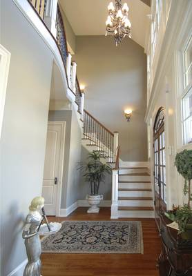 Interior design of stairs in cottage in colonial style.