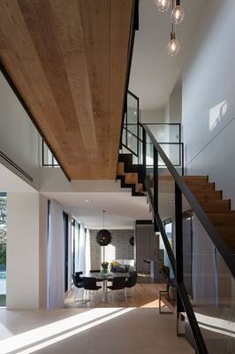 Beautiful design of stairs in country house in contemporary style.