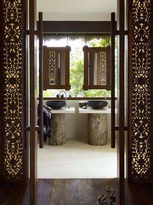 Interior design of bathroom in country house in ethnic style.