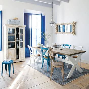 Photo of dining room in country house in Mediterranean style.
