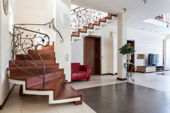 Interior design of stairs in country house in artistic style.