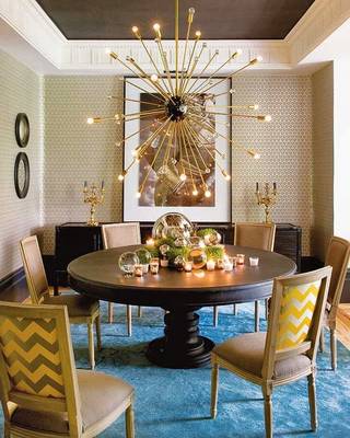 Dining room in cottage in fusion style.