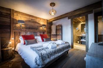 Bedroom example in house in Chalet style.
