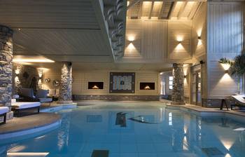 Interior design of pool in house in Chalet style.