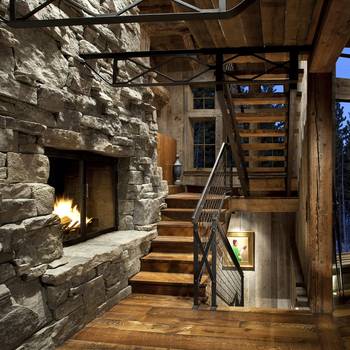 Interior of stairs in cottage in Chalet style.