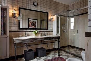 Beautiful example of bathroom in private house in artistic style.