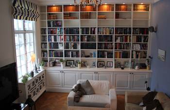 Beautiful design of library in house in artistic style.