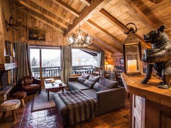 Interior design of attic in country house in Chalet style.