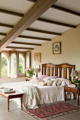 Beautiful interior of bedroom in country house.