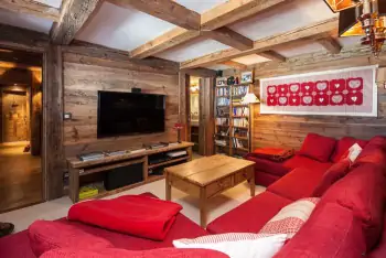 Alpine Chalet with a Modern Accent: Harmony of Wood and Red in Mountain Interior