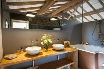 Bathroom in cottage in loft style.