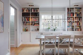 Library interior in cottage in scandinavian style.