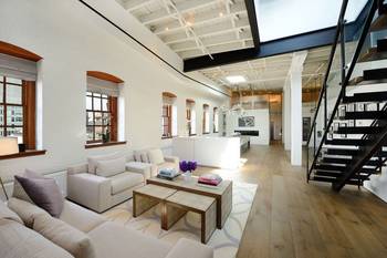 Interior design of studio in country house in loft style.