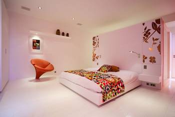 Photo of bedroom in private house in artistic style.